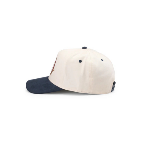 Side view of Lone Star Wrangler Hat in Ivory/Breaker Blue showing contrast blue brim, mesh back, and bold western-inspired front panel