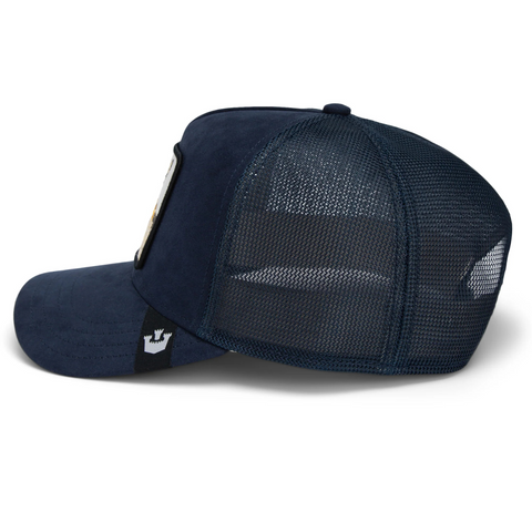 Side angle of the navy Goorin Bros The Suede Goat cap, showing the breathable mesh back and curved bill.