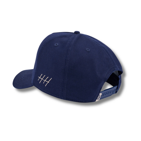 Back view of Huega House Athletic Association Hat in Navy with adjustable strap and metal buckle closure for a secure fit