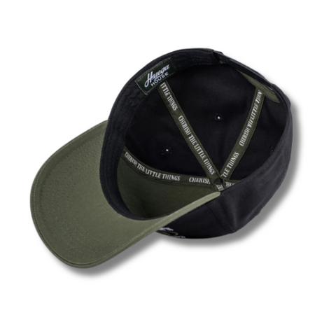 Flat lay of Huega House Circuit Hat in Army Green/Black showcasing flat brim, tonal front embroidery, and two-tone color design
