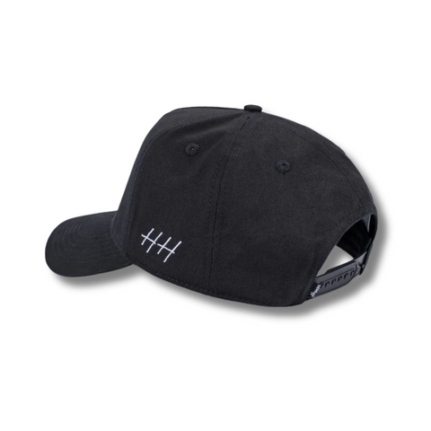 Back view of Huega House Circuit Hat in Black with adjustable snapback closure and matte finish fabric for a modern look
