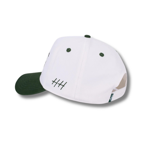 Back view of Huega House Moments Hat in Pine Green and White with adjustable strap and matching green back panels