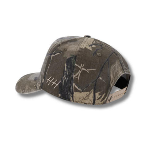 Back view of Huega House Moments Hat in Vintage Camo with adjustable strap closure and full camo coverage across the back panels