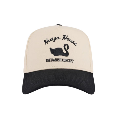 Front view of Huega House Vintage Swan Hat in Black and Natural featuring a retro swan patch on a structured black crown with a natural curved brim