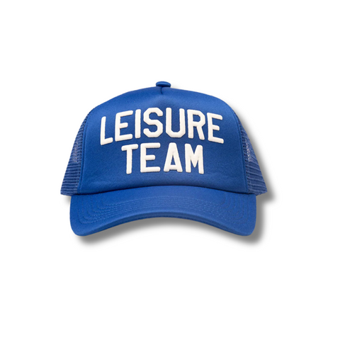 Front view of the Leisure Team Trucker Hat in blue with bold embroidered “Leisure Team” text on structured foam panel