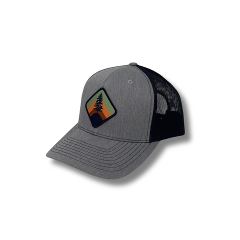 Front view of Local Stated Retro Pine Hat in Heather Grey and Navy featuring a vintage-style pine tree patch on a structured grey crown with a navy brim