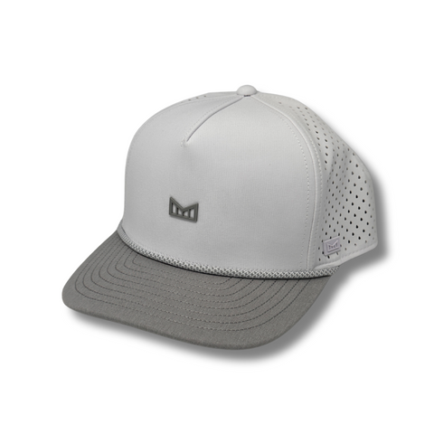 Side view of Melin Hydro Odyssey Rope Bulls Icon Hat in White/Grey showing curved brim, breathable side panels, and water-resistant construction