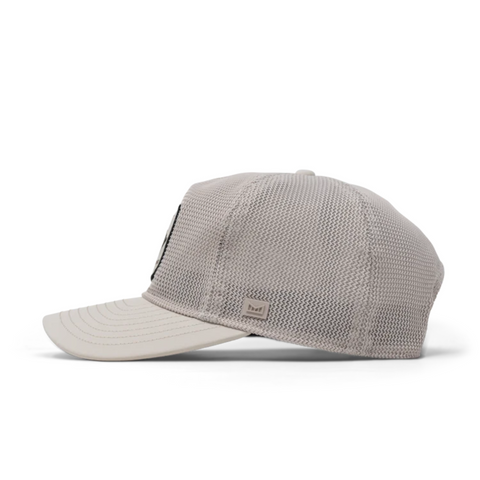 Side view of Melin Odysea Mac Retro Hydro in Moon showing curved brim, tonal stitching, and lightweight, water-resistant panels