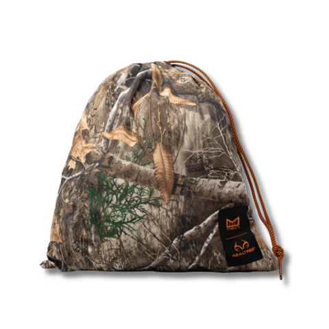 Close-up of the vibrant Real Tree Neon Camo pattern, logo patch, and premium stitching on the Melin Odyssey Hydro Hat