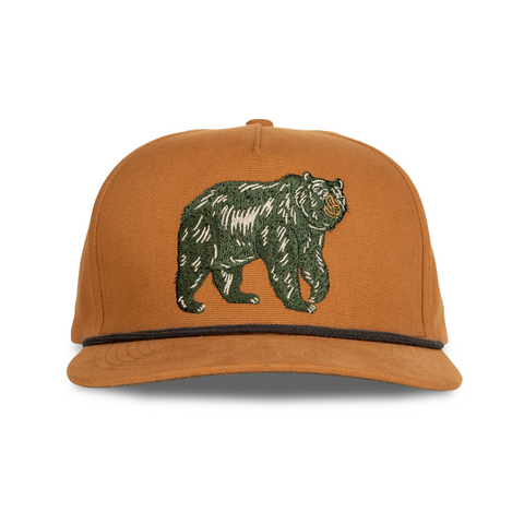 Front view of Sendero Bear Hat featuring a structured crown with an embroidered bear patch design and curved brim