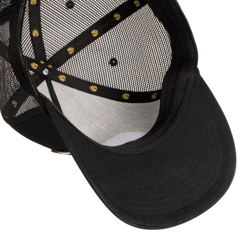 Close-up of Cowboy Pro Shop patch and fabric texture on the Sendero Hat in Black