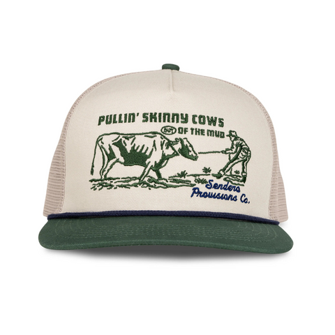 Front view of Sendero Skinny Cows Hat in Cream and Green featuring a playful embroidered “Skinny Cows” patch on a structured cream crown with a green curved brim