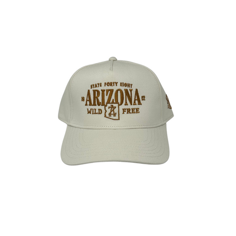 Front view of the State 48 Wild & Free Hat in ecru, showcasing the bold patch logo and soft, neutral-toned crown