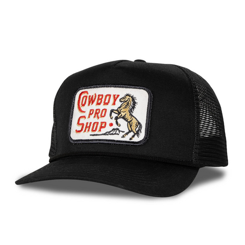 Front view of Sendero Cowboy Pro Shop Hat in Black featuring an embroidered retro-style Cowboy Pro Shop patch on a structured crown with a curved brim