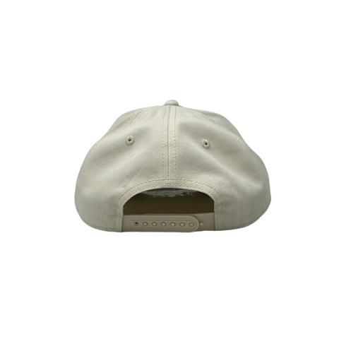 Back view of the Wild & Free hat in ecru by State 48, featuring a breathable mesh back and adjustable snapback closure