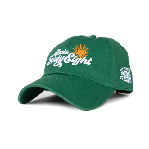 Side view of State Forty Eight Dad Hat Sunny in Kelly Green showing curved brim and relaxed low-profile fit